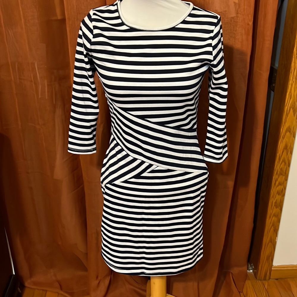 Navy and white striped dress, beautiful design in front. Very slimming.